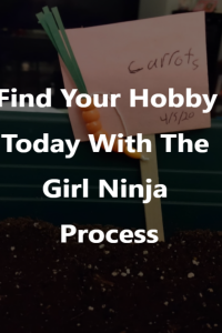Popsicle stick stuck in soil sticks out with a paper sign reading Carrots 4/5/20 and a a carrot made out of orange beads and green paper. Over popsicle stick white block text reads Find Your Hobby Today With the Girl Ninja Process