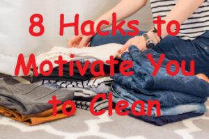 3 piles of folded laundry, arms and midsection of body seen folding shirt atop the piles of folded laundry. 8 Hacks to Motivate You to Clean