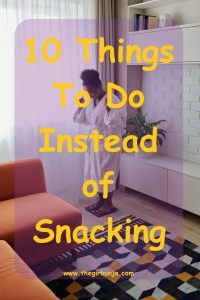 GIrl with hair pulled up standing in white bathrobe on black scale with elbows bent and fists held near her shoulders. Translucent purple rectangle is laid over girl in bathrobe with large yellow text that reads 10 Things To Do Instead of Snacking